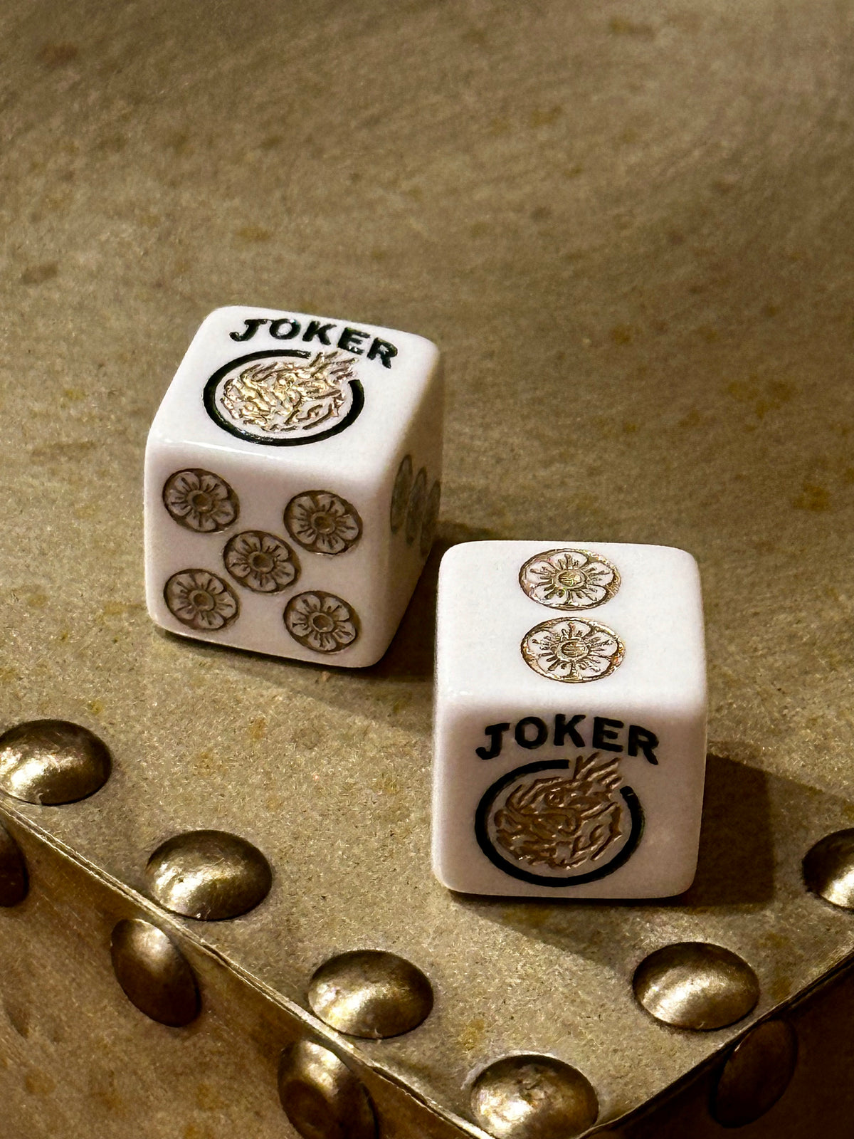 One Joker Away - one pair of white 19mm size dice with gold and silver