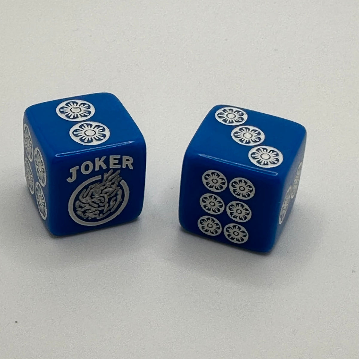 One Joker Away - one pair of slightly larger 19 mm blue dice with white and silver