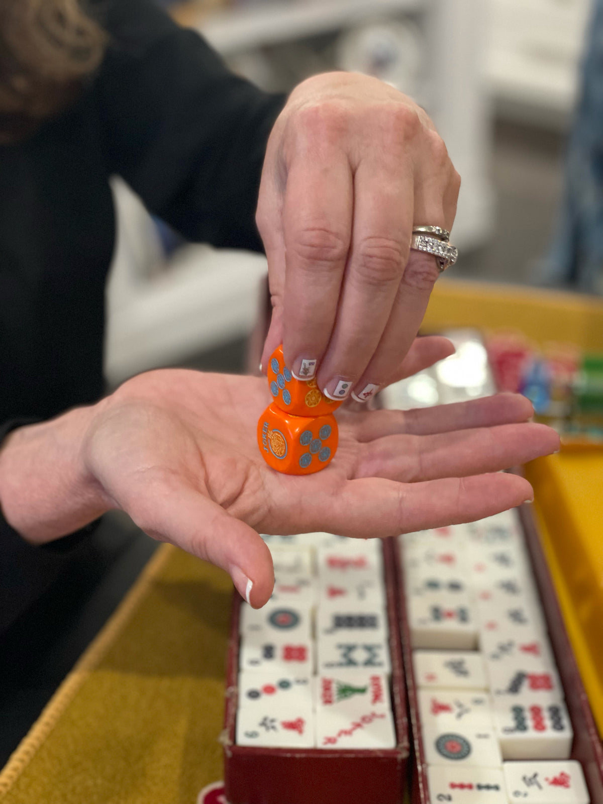 Jumbo Orange One Joker Away  - one pair of Jumbo 22 mm curved edge orange Mahjong Dice with yellow and blue hand painted accents