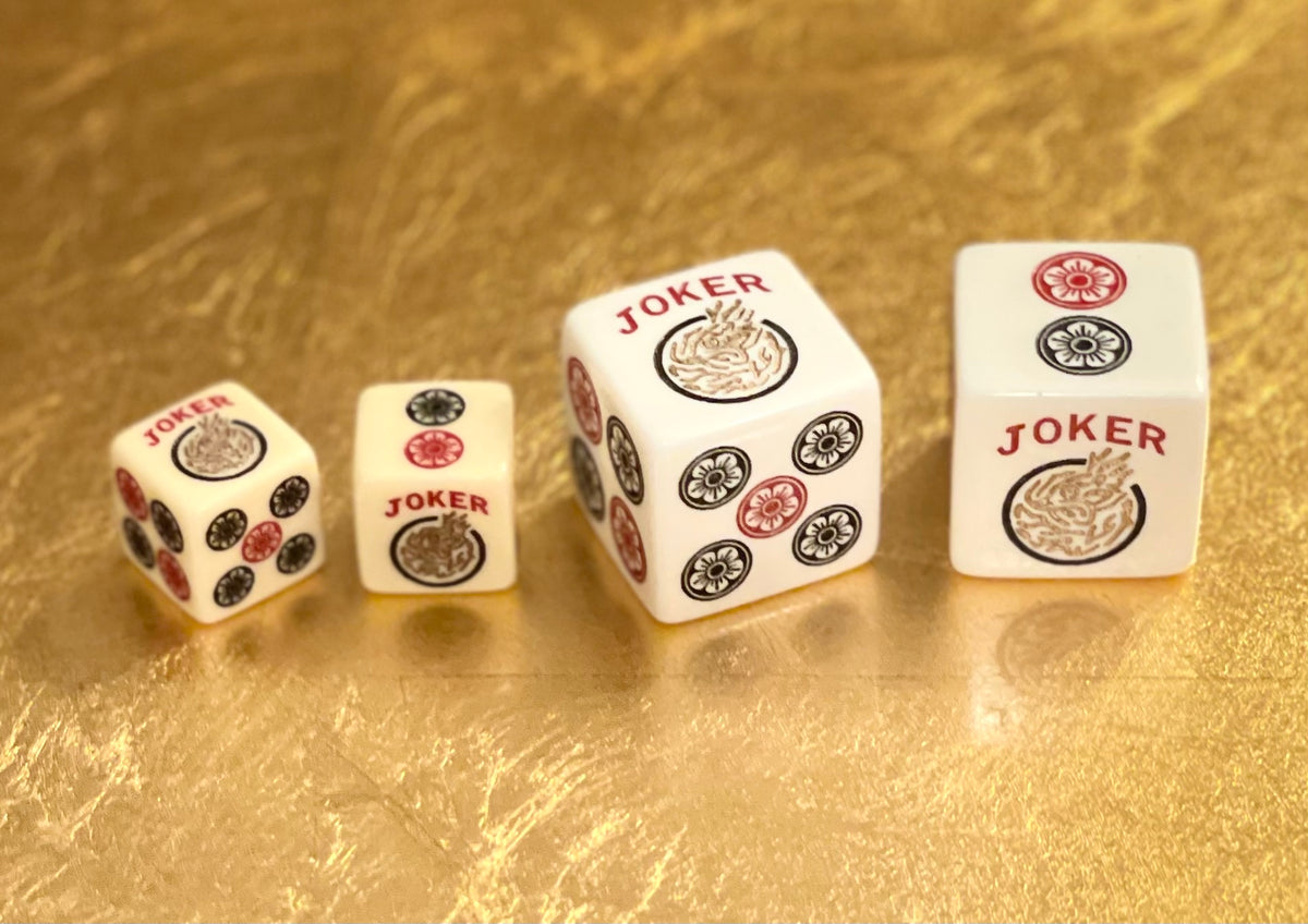 Jumbo Golden Joker  - one pair of Jumbo 25mm white dice with red, black and golden accents