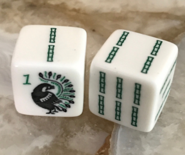 Lucky Bamboo - one pair of white dice with peacock and bam designs in green and black