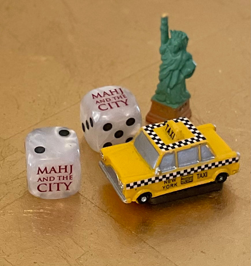 MAHJ AND THE CITY - The Sequel one pair of pearlized white dice with black pips and red font