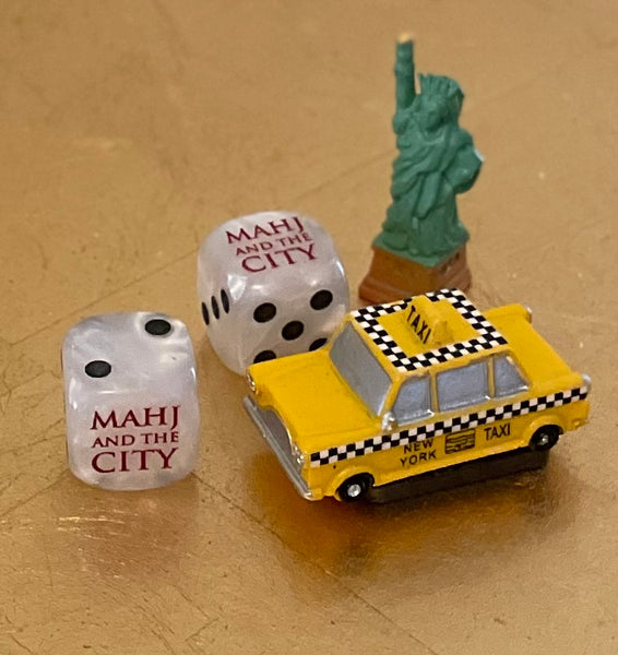MAHJ AND THE CITY - The Sequel one pair of pearlized white dice with black pips and red font